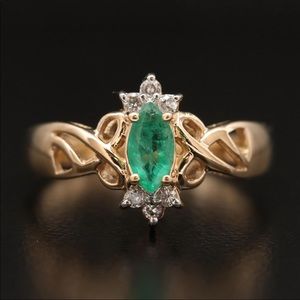 Emerald and diamond ring